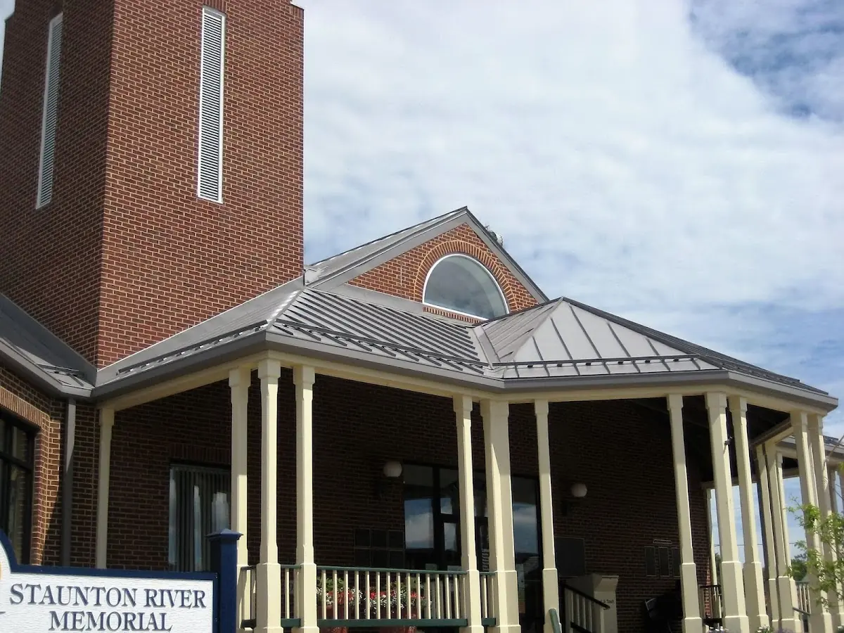 Skilled roofing craftsmen working on a residential roof in Downtown St. Cloud